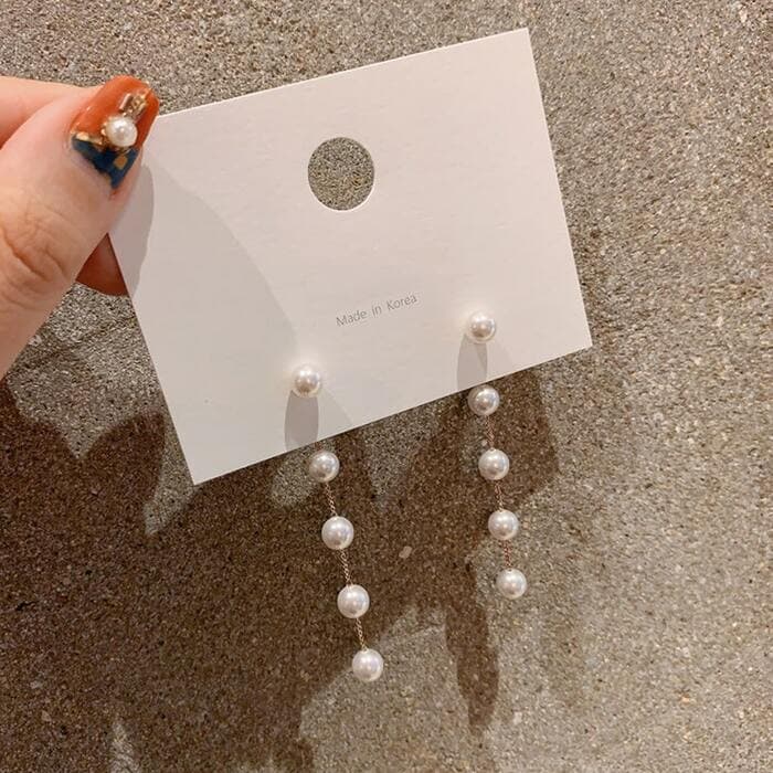 骨格ウェーブロングパールピアス